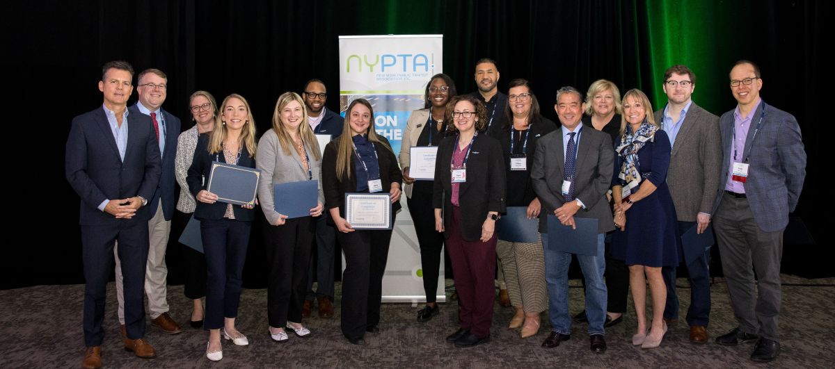 The PTLI graduating class of 2026 poses together at the NYPTA annual conference.